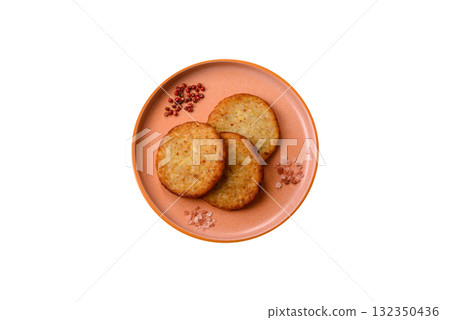 Hash browns, fried potato and onion pancakes with spices for breakfast. Fried hash browns 132350436