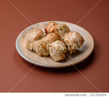 Chicken shish pieces fried on a skewer with salt and spices. Chicken shashlik 132350503