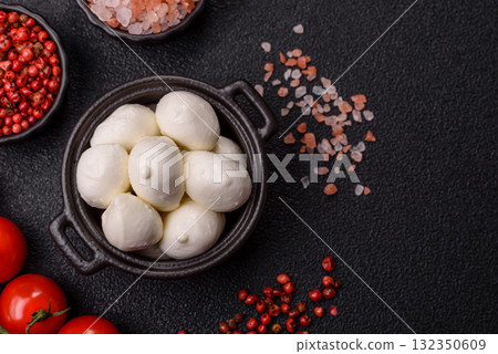 Mozzarella cheese balls, fresh white mini slices for Mediterranean food. Mozzarella cheese 132350609