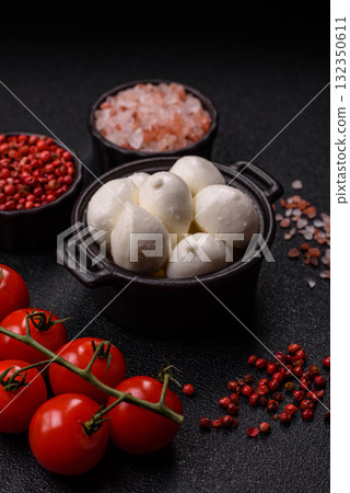 Mozzarella cheese balls, fresh white mini slices for Mediterranean food. Mozzarella cheese 132350611