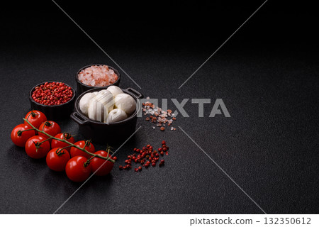 Mozzarella cheese balls, fresh white mini slices for Mediterranean food. Mozzarella cheese 132350612