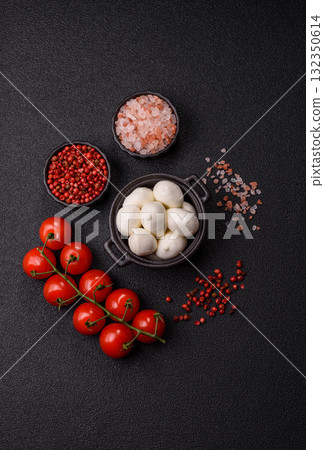 Mozzarella cheese balls, fresh white mini slices for Mediterranean food. Mozzarella cheese Mozzarella cheese balls, fresh white mini slices for Mediterranean food. Mozzarella cheese 132350614