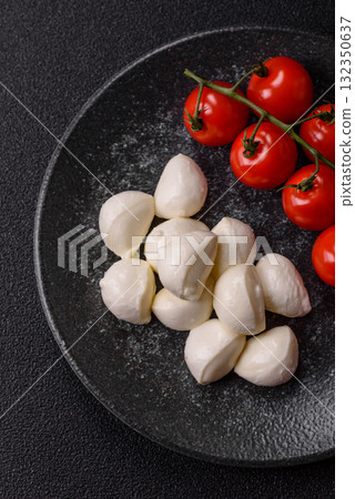 Mozzarella cheese balls, fresh white mini slices for Mediterranean food. Mozzarella cheese Mozzarella cheese balls, fresh white mini slices for Mediterranean food. Mozzarella cheese 132350637