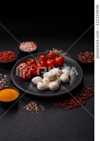 Mozzarella cheese balls, fresh white mini slices for Mediterranean food. Mozzarella cheese 132350646