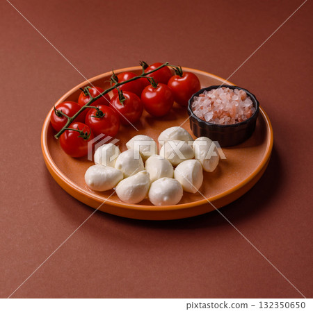 Mozzarella cheese balls, fresh white mini slices for Mediterranean food. Mozzarella cheese 132350650