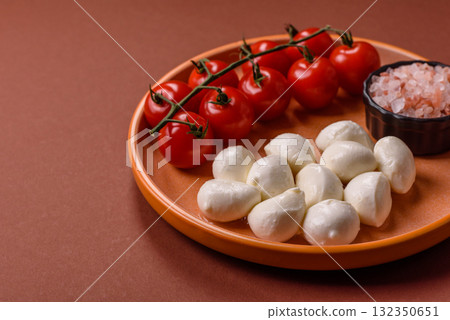 Mozzarella cheese balls, fresh white mini slices for Mediterranean food. Mozzarella cheese 132350651
