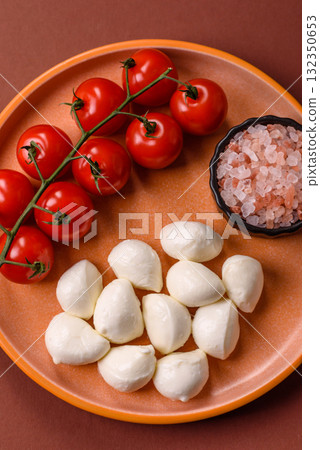 Mozzarella cheese balls, fresh white mini slices for Mediterranean food. Mozzarella cheese 132350653