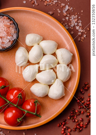Mozzarella cheese balls, fresh white mini slices for Mediterranean food. Mozzarella cheese 132350656