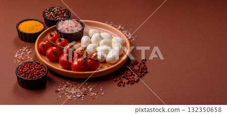 Mozzarella cheese balls, fresh white mini slices for Mediterranean food. Mozzarella cheese 132350658