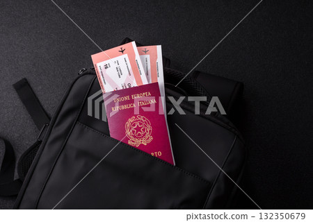 Italy passport, visa for travel, document with tickets in travel bag. Italian passport Italy passport, visa for travel, document with tickets in travel bag. Italian passport 132350679