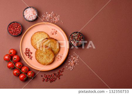 Hash browns, fried potato and onion pancakes with spices for breakfast. Fried hash browns 132350733