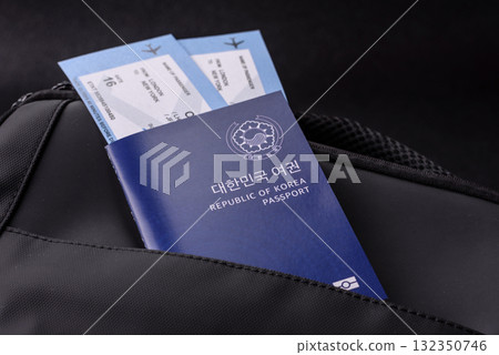 Passport South Korea, Travel Visa, Ticket Document in Travel Bag. Korean Passport Passport South Korea, Travel Visa, Ticket Document in Travel Bag. Korean Passport 132350746