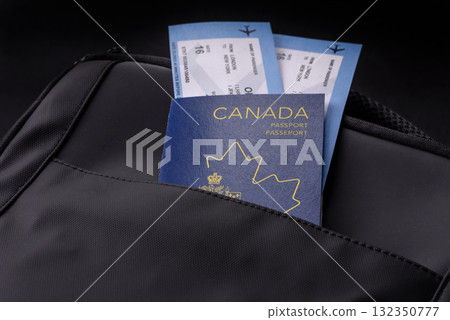 Passport Canada, visa for travel, document with tickets in travel bag. Canadian passport 132350777