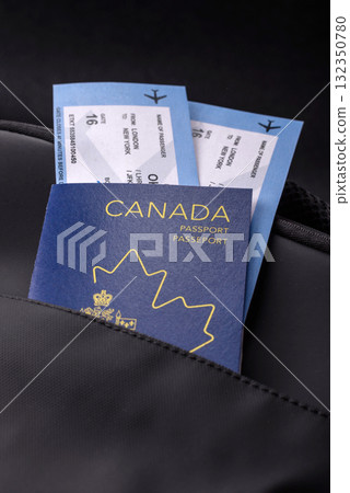 Passport Canada, visa for travel, document with tickets in travel bag. Canadian passport 132350780