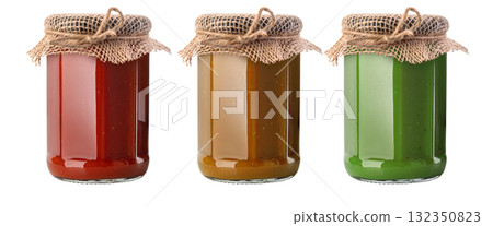 Three glass jars with homemade colorful jam, transparent background Three glass jars with homemade colorful jam, transparent background 132350823
