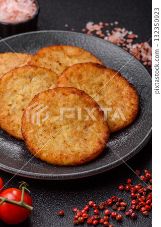 Hash browns, fried potato and onion pancakes with spices for breakfast. Fried hash browns 132350923