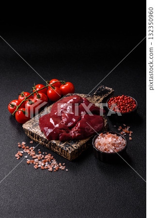 Raw fresh chicken or turkey liver, internal offal of poultry. Raw chicken liver Raw fresh chicken or turkey liver, internal offal of poultry. Raw chicken liver 132350960