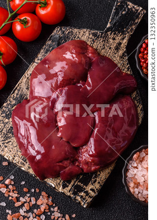 Raw fresh chicken or turkey liver, internal offal of poultry. Raw chicken liver Raw fresh chicken or turkey liver, internal offal of poultry. Raw chicken liver 132350963
