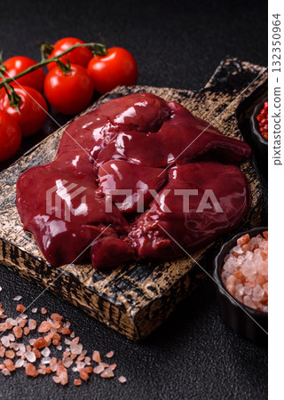 Raw fresh chicken or turkey liver, internal offal of poultry. Raw chicken liver Raw fresh chicken or turkey liver, internal offal of poultry. Raw chicken liver 132350964