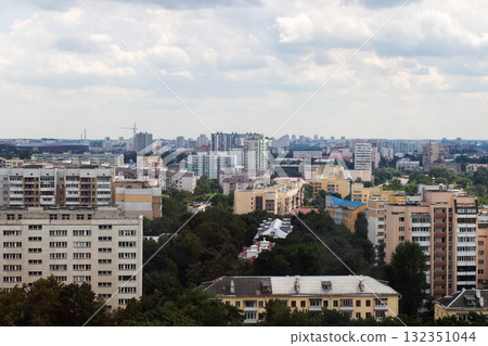 Cityscape View with Modern Architecture Amidst Cloudy Skies 132351044