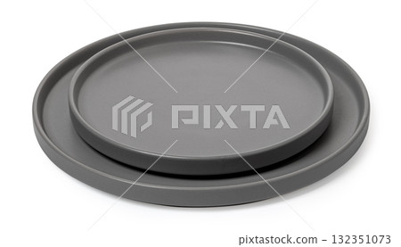 Stacked grey ceramic plates for modern minimalist tableware 132351073