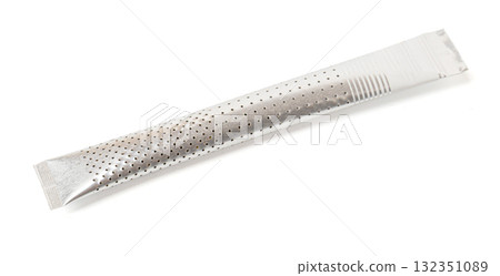 Perforated single-serving tea stick infuser on white background 132351089
