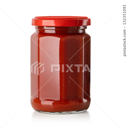 Jar of homemade tomato sauce with red lid Jar of homemade tomato sauce with red lid 132351091