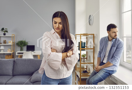 Stressed family couple arguing at home, facing away from each other 132351153