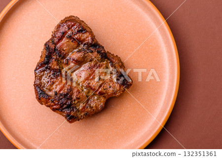 Pork breast steak, grilled fillet, healthy food, lunch. Pork steak as food background Pork breast steak, grilled fillet, healthy food, lunch. Pork steak as food background 132351361
