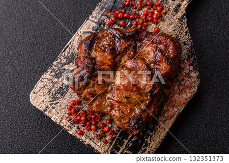 Pork breast steak, grilled fillet, healthy food, lunch. Pork steak as food background Pork breast steak, grilled fillet, healthy food, lunch. Pork steak as food background 132351373