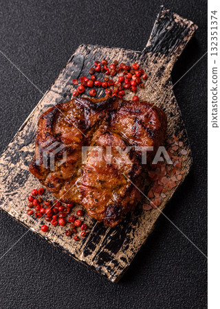 Pork breast steak, grilled fillet, healthy food, lunch. Pork steak as food background Pork breast steak, grilled fillet, healthy food, lunch. Pork steak as food background 132351374