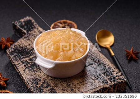 Apple sweet sauce, baby food, canned ingredient for desserts. Apple sauce Apple sweet sauce, baby food, canned ingredient for desserts. Apple sauce 132351680