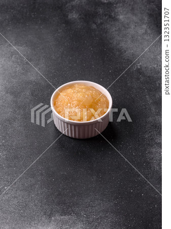 Apple sweet sauce, baby food, canned ingredient for desserts. Apple sauce 132351707