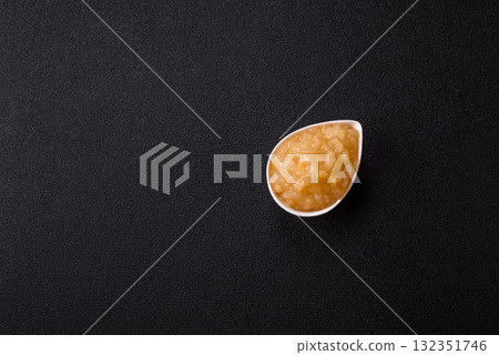 Apple sweet sauce, baby food, canned ingredient for desserts. Apple sauce Apple sweet sauce, baby food, canned ingredient for desserts. Apple sauce 132351746