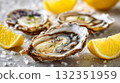 A close-up of fresh oysters with lemon slices and salt on a light surface, details. Concept of seafood, shell texture 132351959