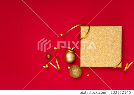 Horizontal background with golden gift box lid, baubles, ribbon and confetti. Great template for banner, header or sale promo. Horizontal background with golden gift box lid, baubles, ribbon and confetti. Great template for banner, header or sale promo. 132352140