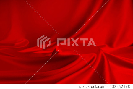 Vibrant red silk with rich folds and glossy drape forming a festive podium. Luxury background for jewelry, perfume, gifts and christmas promotions. 132352158