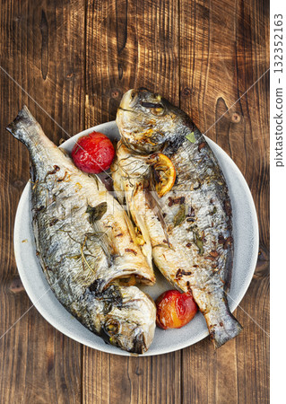 Roasted whole sea bream fish or dorado. Roasted whole sea bream fish or dorado. 132352163