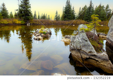 Peaceful waters of little lake in mountains in the autumn. 132352219