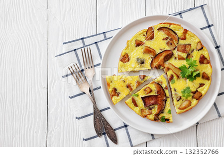 tasty porcini mushroom parmesan omelette, top view tasty porcini mushroom parmesan omelette, top view 132352766
