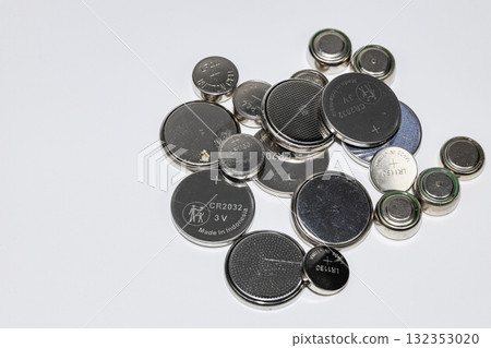 Variety of used Alkaline or lithium Battery or Button cell battery or coin cell isolated on white background. Variety of used Alkaline or lithium Battery or Button cell battery or coin cell isolated on white background. 132353020