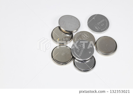 Variety of used Alkaline or lithium Battery or Button cell battery or coin cell isolated on white background. Variety of used Alkaline or lithium Battery or Button cell battery or coin cell isolated on white background. 132353021