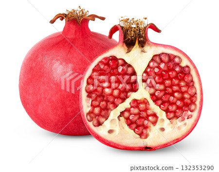 Ripe pink pomegranate and cut in a half with seeds isolated with clipping path 132353290