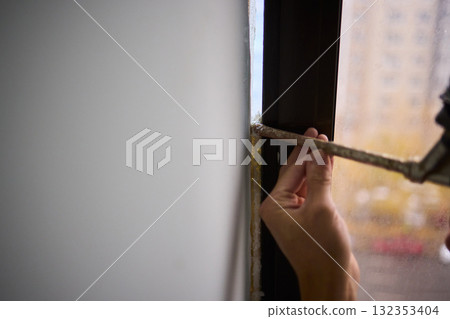 The Process of Applying Sealant During the Installation of Windows in Buildings and Homes The Process of Applying Sealant During the Installation of Windows in Buildings and Homes 132353404