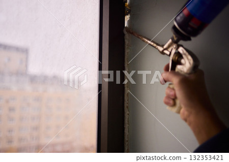 The Process of Applying Sealant During the Installation of Windows in Buildings and Homes 132353421
