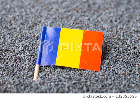 Flag of Romania in poppy seed. Growing poppy seed in Romania, origin of grain Flag of Romania in poppy seed. Growing poppy seed in Romania, origin of grain 132353556