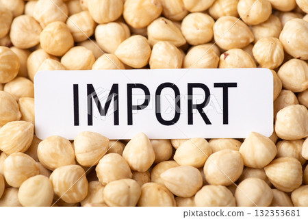 Paper with inscription Import on hazelnut. Trade of hazelnut concept 132353681