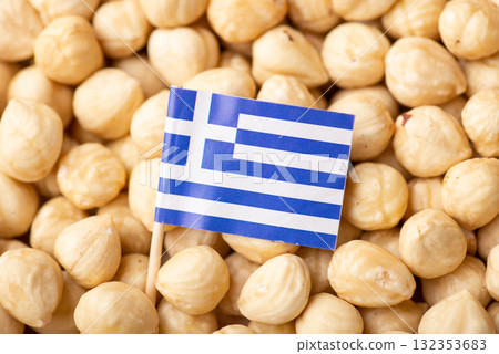 Flag of Greece on hazelnuts. Agrobusiness of growing hazelnuts in Greece Flag of Greece on hazelnuts. Agrobusiness of growing hazelnuts in Greece 132353683