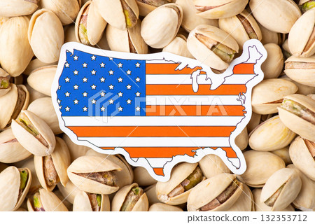 Paper flag and map of USA on pistachio. Growing pistachios in USA, origin of of nuts Paper flag and map of USA on pistachio. Growing pistachios in USA, origin of of nuts 132353712