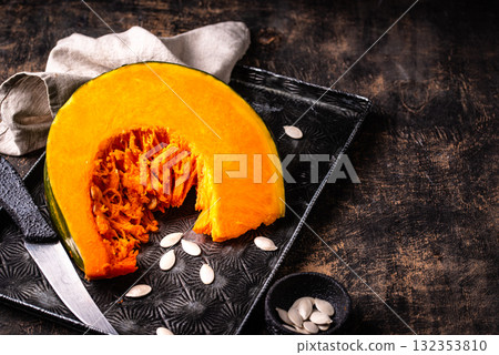 Raw sliced pumpkin with seed 132353810